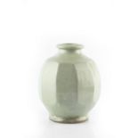 Mike Dodd (b.1943) Vase light celadon glaze, faceted sides impressed potter's seal 15.6cm high.