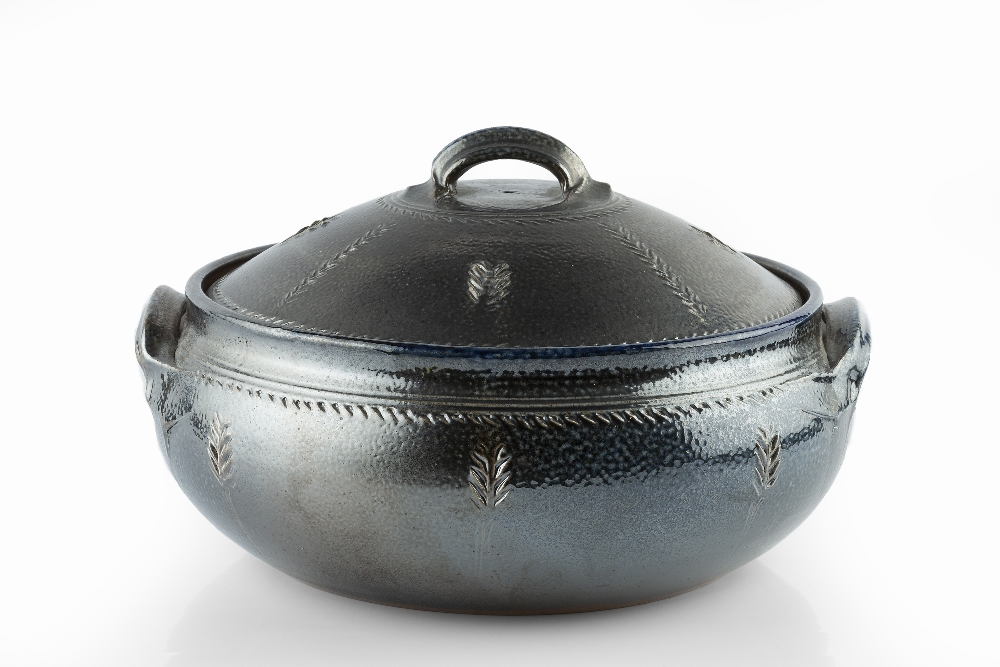 Toff Milway (b.1949) Casserole dish blue glaze, with incised sprigs signed 34cm across.