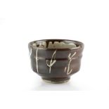 Mike Dodd (b.1943) Bowl wax resist and iron glaze impressed potter's seal 9cm high, 13.5cm