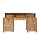 Peter Waals (1870-1937) Sideboard oak, with raised back, two central drawers, flanked by pedestals