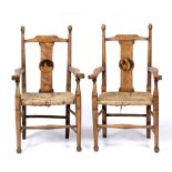 Liberty & Co. Pair of child's chairs, circa 1905 from the nursery rhyme range, oak with rush seats