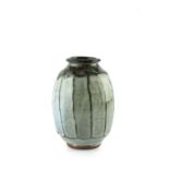 Mike Dodd (b.1943) Vase wood ash glaze, faceted sides impressed potter's seal 22.5cm high.