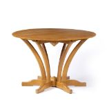 Hugh Birkett (1919-2002) Dining table, 1987 walnut, the top over six shaped and carved supports