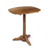 Workshop of Peter Waals (1870-1937) Occasional table walnut 68cm high, 60cm across, 50cm deep.