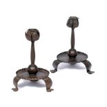 Glasgow School Pair of Arts & Crafts candlesticks wrought iron, in the form of thistle heads with