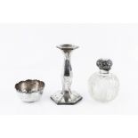 A COLLECTION OF SILVER, comprising a candlestick, of shaped hexagonal form, 18cm high; a cut glass