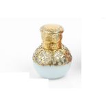 A MID VICTORIAN SILVER GILT MOUNTED OPALINE GLASS GLOBULAR SCENT BOTTLE, the opaque white body