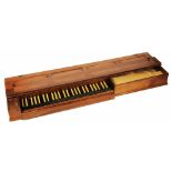 A WALNUT CASED CLAVICHORD by Donald Gill, the keyboard well inscribed with name and dated '