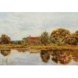 CHARLES LOW (c.1860-c.1920) View of a farm across a pond, signed, watercolour, 26 x 37cm