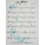 A PRINTED MUSIC SCORE for 'Zoo Station', words by Bono and music by U2, signed in green pen by