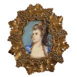 AFTER SIR JOSHUA REYNOLDS Portrait of Mrs Siddons, watercolour on ivory, 4 x 3cm, oval in gilt metal