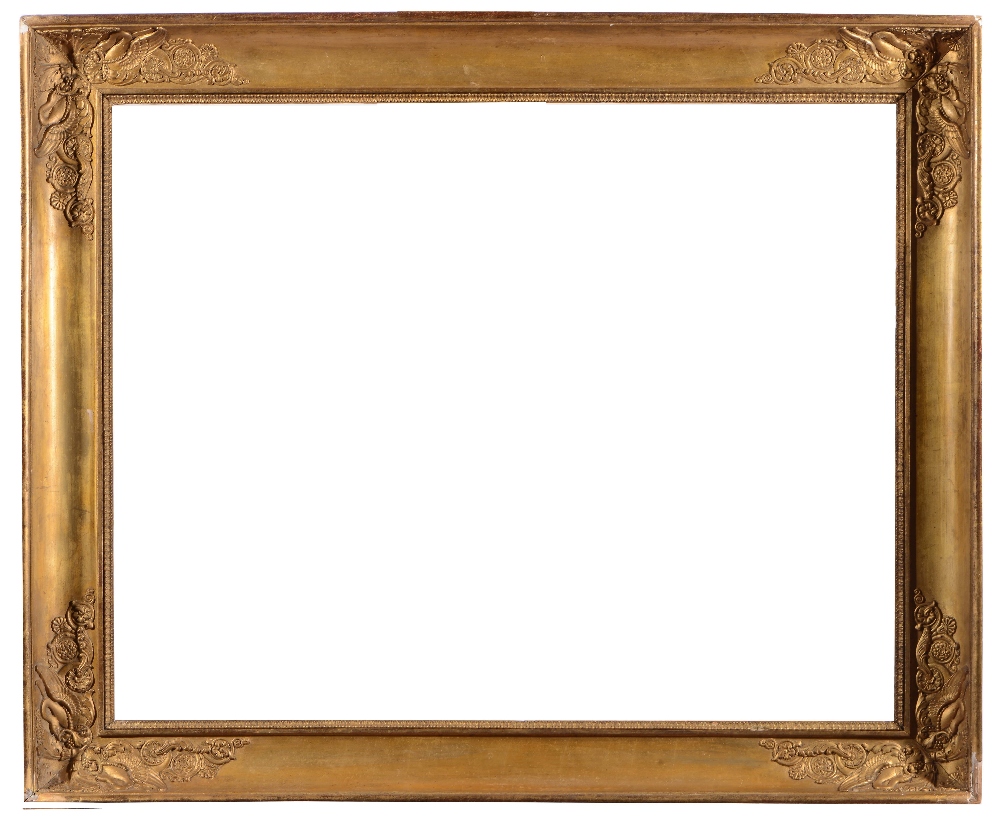 A FRENCH EMPIRE GILT AND GESSO FRAME with lamb's tongue sight and plain hollow with swan and