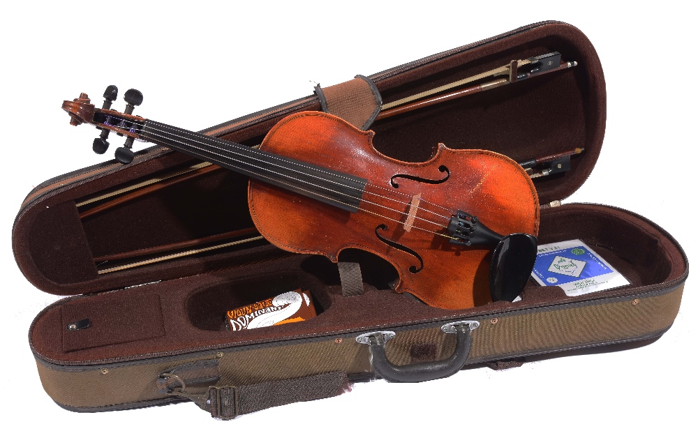 A GERMAN VIOLIN with two piece back and printed label inscribed 'Copie of Stradivarius' together