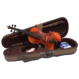 A GERMAN VIOLIN with two piece back and printed label inscribed 'Copie of Stradivarius' together