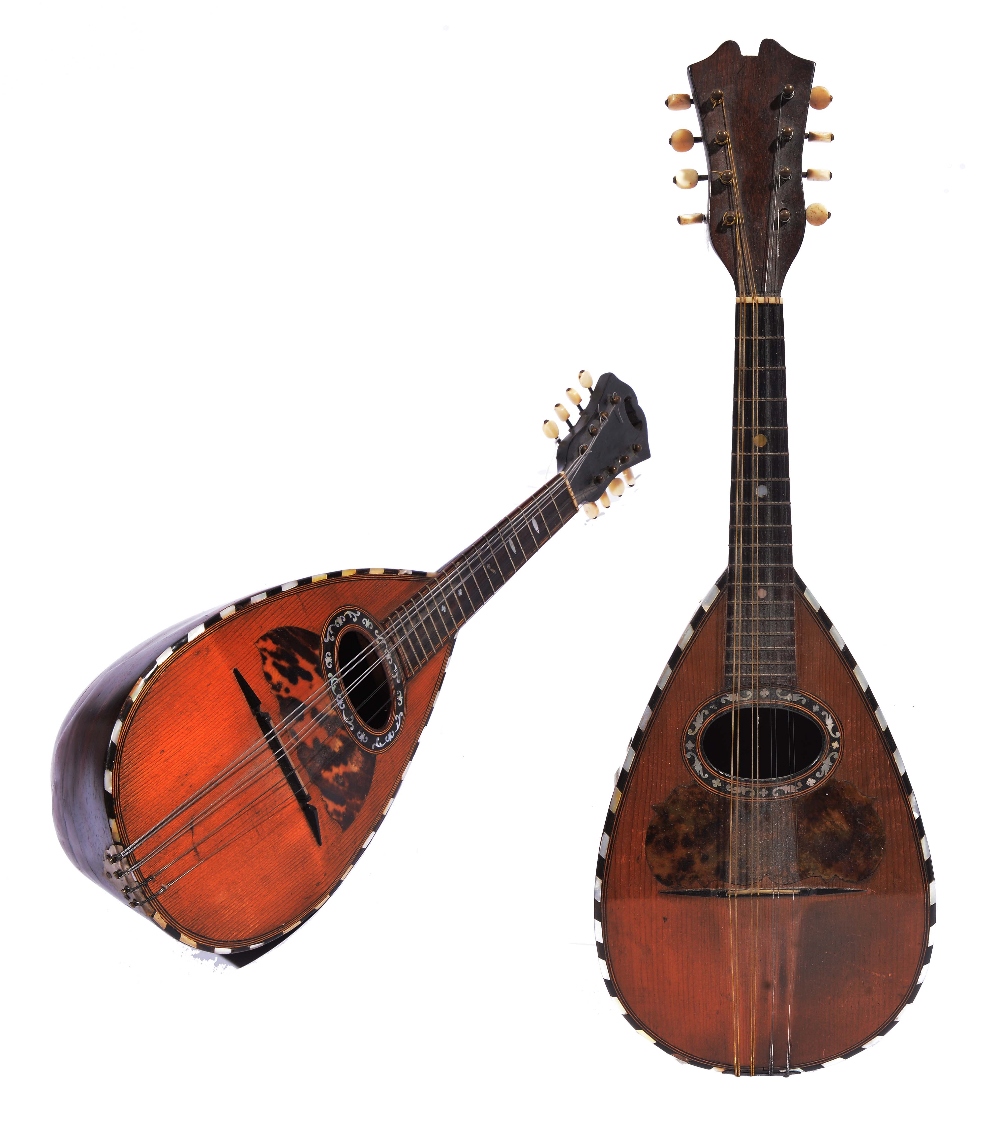 A MANDOLIN, the rosewood back with line inlay, mother of pearl and tortoiseshell decorated sound