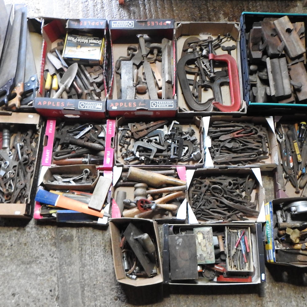 A large collection of workshop hand tools