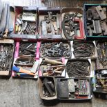 A large collection of workshop hand tools