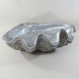 A large painted silver shell shaped dish,
