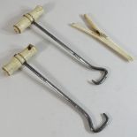 A pair of 19th century bone handled boot pulls,