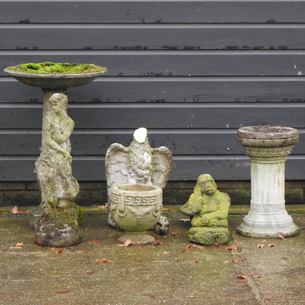 A reconstituted stone bird bath, 77cm high,