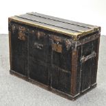 A 19th century leather and brass bound travelling trunk,