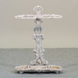 A Victorian white painted cast iron stick stand,