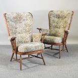 A pair of Ercol high back armchairs,