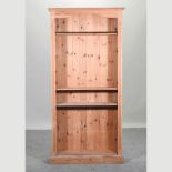 A pine standing open bookcase,
