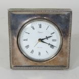 A silver mounted easel clock, London 1987,