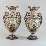 A pair of Zsolnay style floral decorated two handles vases,