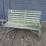 A wooden slatted garden bench,