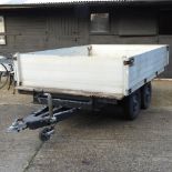 A twin axle car trailer,