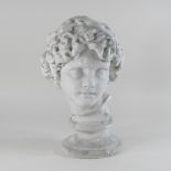 A plaster bust of a young girl,