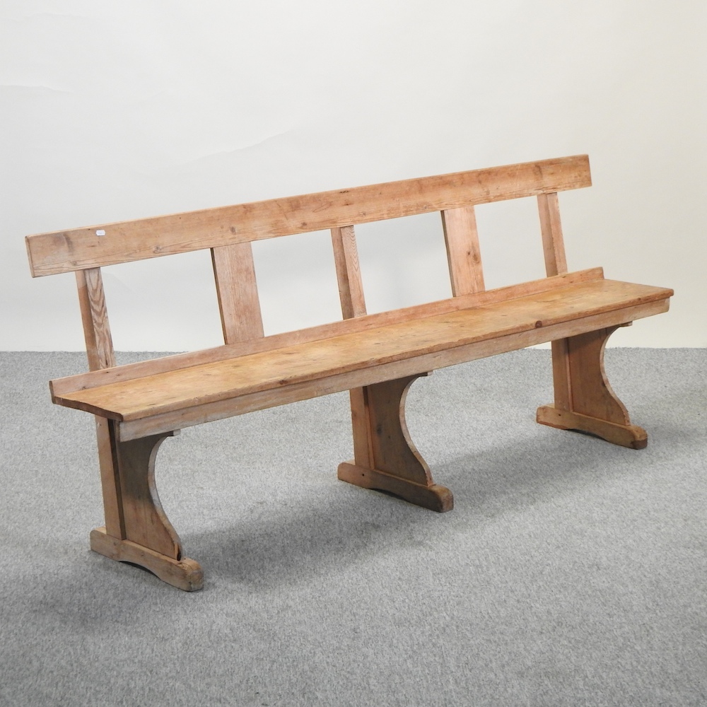 An early 20th century pine bench,