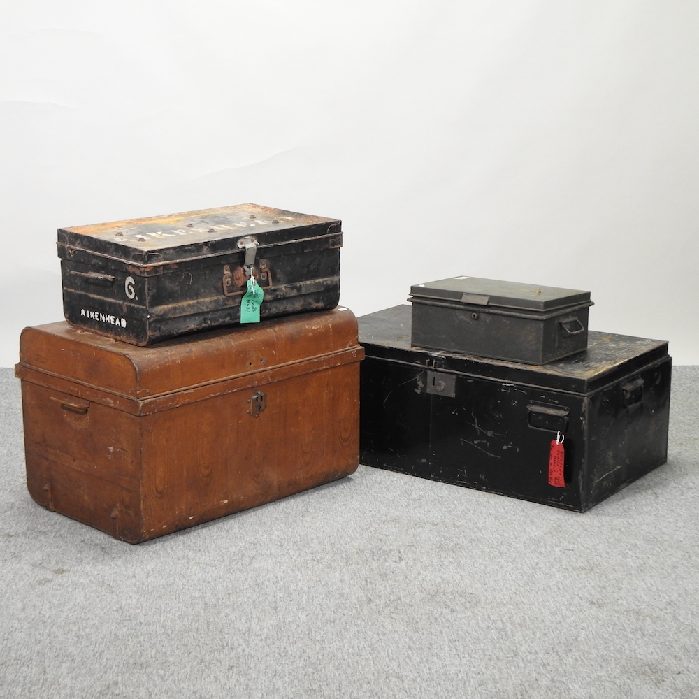 Four various metal trunks,