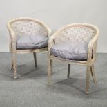 A pair of Regency style painted bergere armchairs