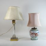A cut glass and brass mounted table lamp and shade, 61cm high overall,