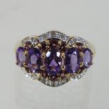 A 9 carat gold amethyst and diamond ring,