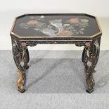 A Chinese black lacquered coffee table,