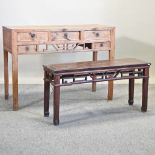 A Chinese carved pine altar table, containing drawers, 122cm,