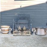 A cast iron fire grate, 57cm, together with a spark guard, brass fender, coal bucket,