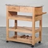 A beech kitchen island, with a granite top,