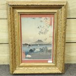 A Japanese woodblock print, in a gilt frame,