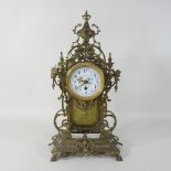 An early 20th century continental brass cased mantel clock,