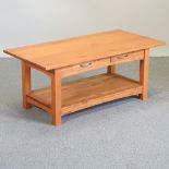 A cherrywood coffee table,
