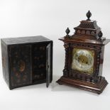A Victorian walnut mantel clock, 53cm high,