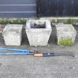 Three reconstituted stone garden planters, together with two hand tools, a side bar cropper,