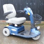 A blue three wheeled mobility scooter