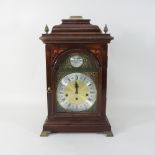 A reproduction mahogany bracket clock,