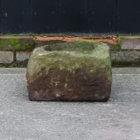 A carved stone bird bath,